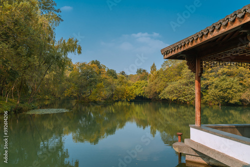 Chinese pavilion at the West lake in Hangzhou, China, autumn time.