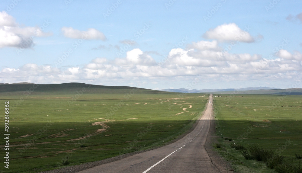 Road to the mountains in Inner Mongolia. Consept of traveling, way, road trip