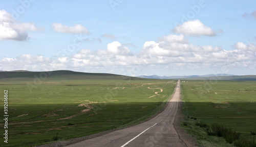 Road to the mountains in Inner Mongolia. Consept of traveling, way, road trip