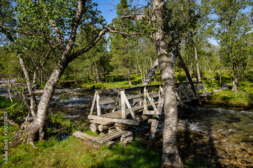 Stable footbrigde over a river in Norway