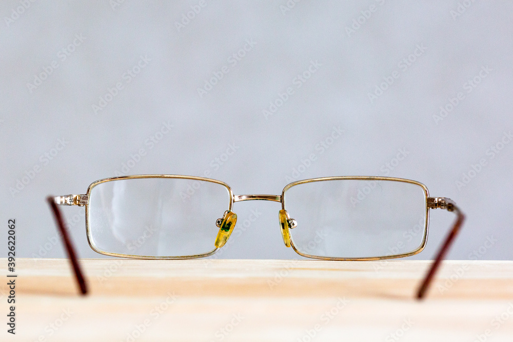 Glasses on a wooden background. Future perspective perspective. Glasses on a wooden background. Future perspective perspective.
