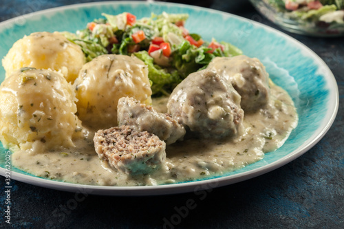 Meatballs with creamy and cheese gravy served with mashed potatoes