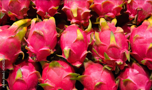 Group of dragon fruit or pitaya fruit in basket at super market