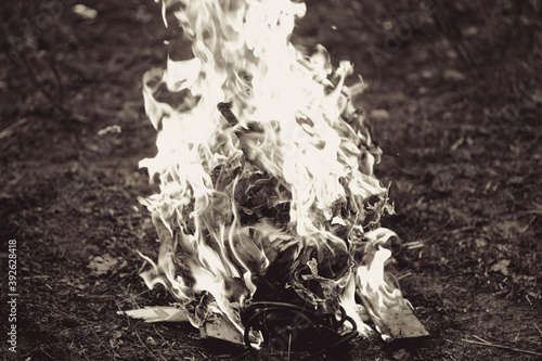 Bright hot red flames and gray smoke from burning construction debris Gorenje