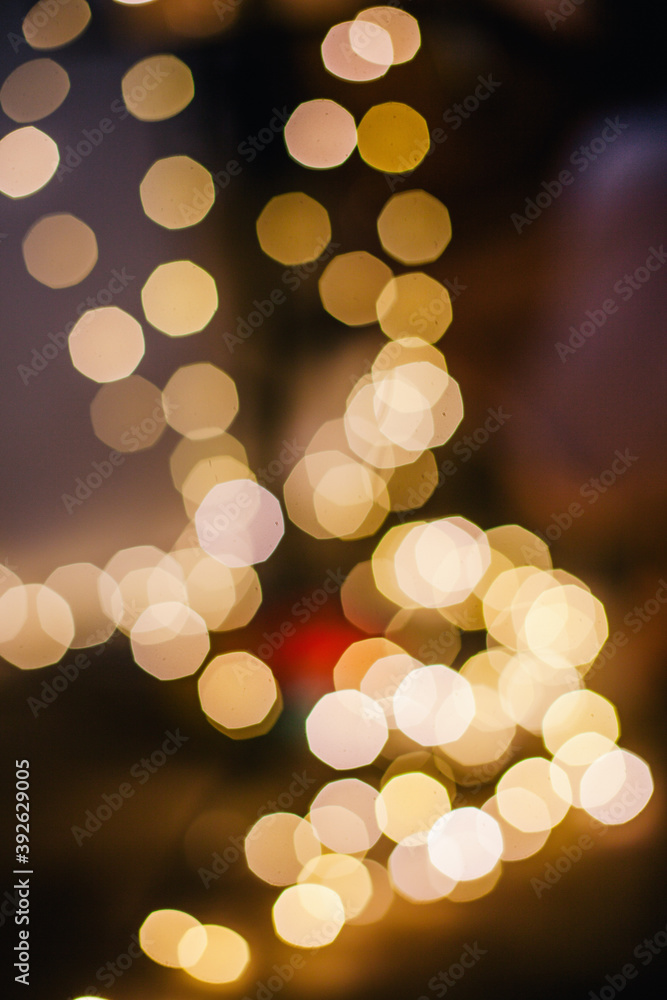 Bokeh from the Christmas garland in a dark room