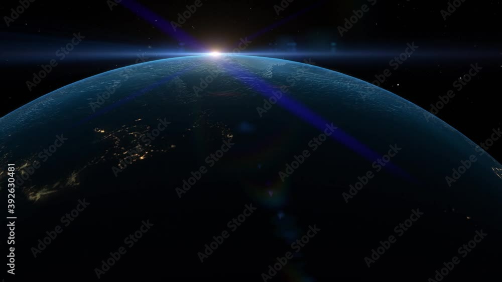 Slow flight over the Earths globe from space. The sun is shining over the horizon with sun flares. Slow flight over the Earths globe from space. The sun is shining over the horizon with sun flares.