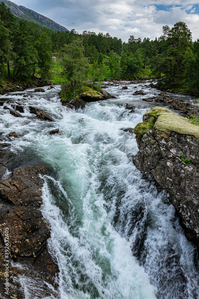 Fototapeta premium Huge waterfall with its river
