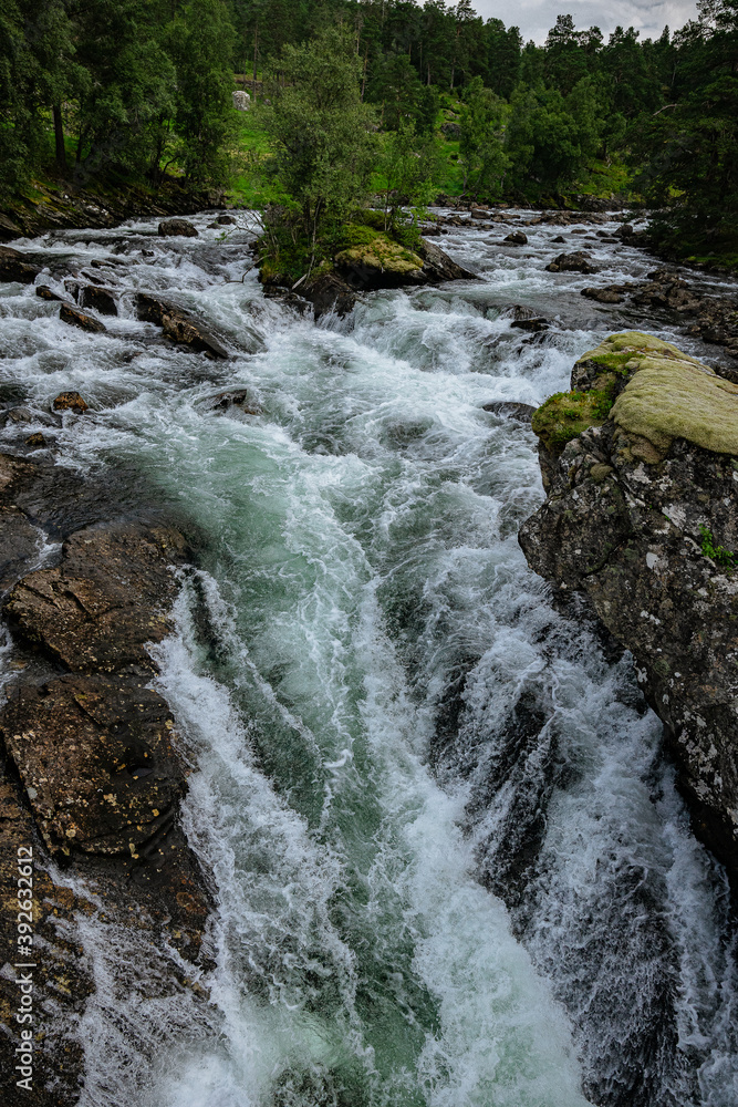 Fototapeta premium Huge waterfall with its river