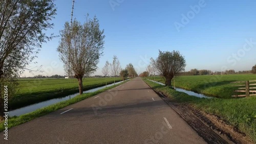 POV driving along Lopik radio tower in Holland photo