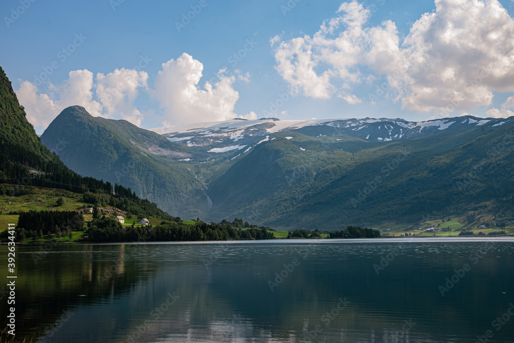Reflection from the mountains in a fjord