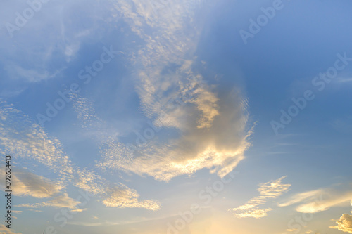 Landscape fantastic Sunset or sunrise with rays of light through the sky. Beautiful white clouds and blue sky high definition skyscraper with grunge texture for background Abstract,nature art style,