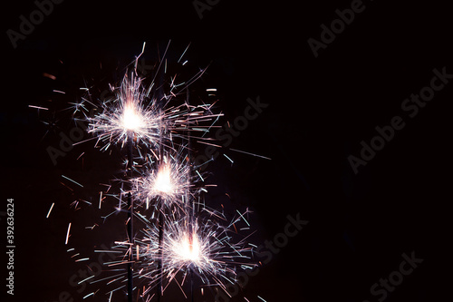 Burning sparkler firework. Happy new year and Merry christmas concept. Party, Holiday decoration, Happy holidays.