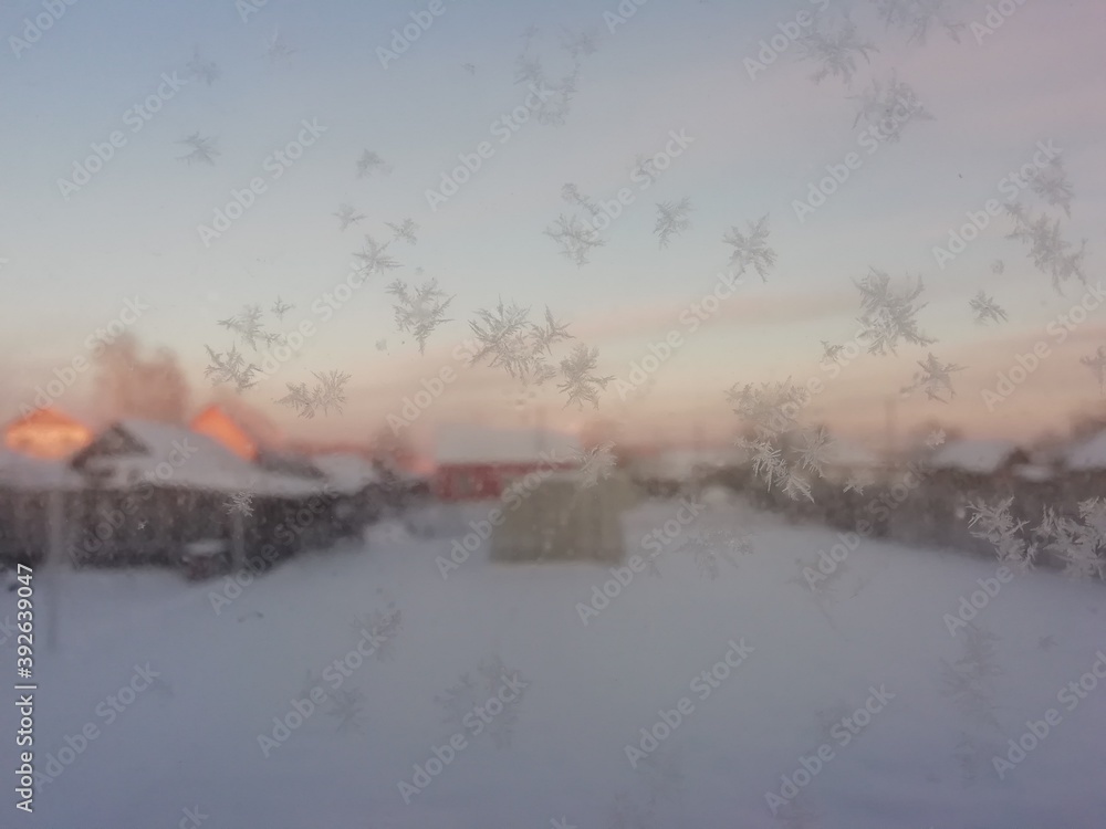 winter patterns on the windows on a cold December morning
winter patterns on the windows on a cold December morning