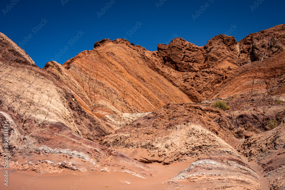 Geological formations in the Talampaya National Park in the Argentine Republic. Huge reddish rocks