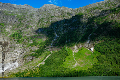 Boeyabreen glacier with green forest photo