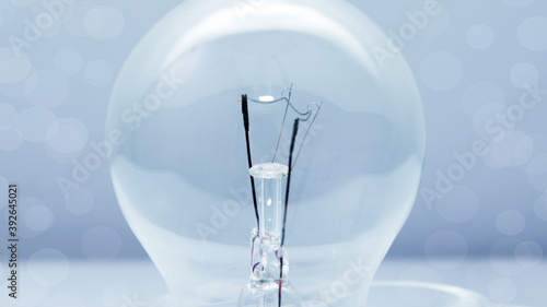 Light bulb on blue background