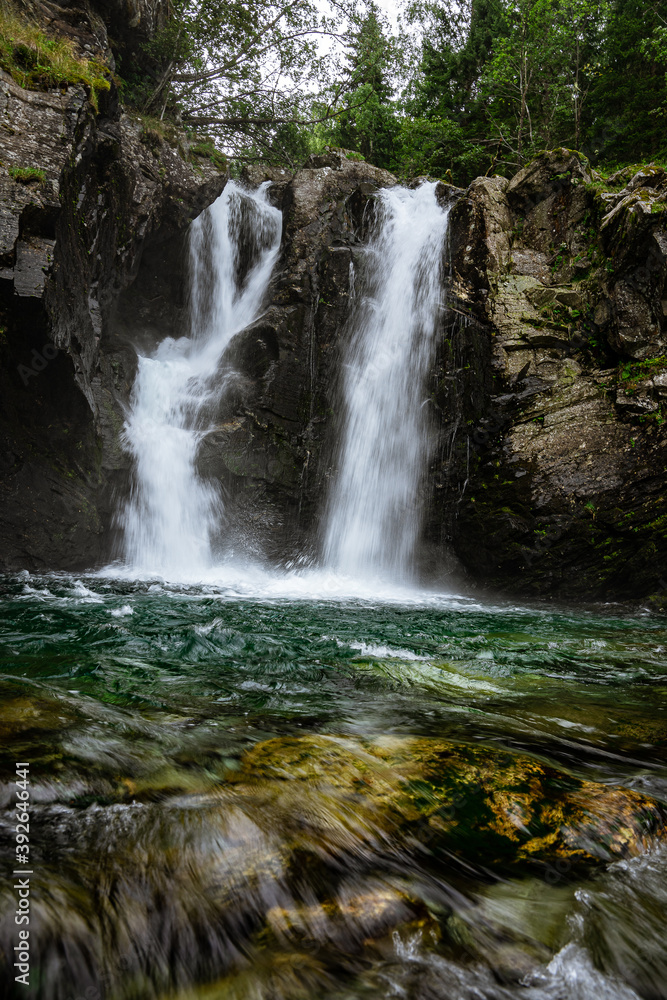 Double waterfall in a forest Double waterfall in a forest