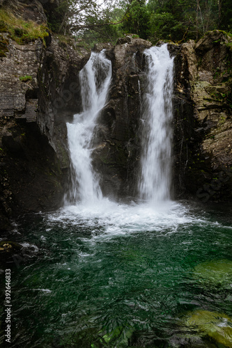 Double waterfall in a forest