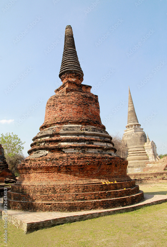 Fototapeta premium UNESCO world heritage. Ancient archaeological site at Ayutthaya Historical Park, Archaeological sites of Thailand in Ayutthaya, ancient and beautiful. Ayutthaya Province, Thailand.
