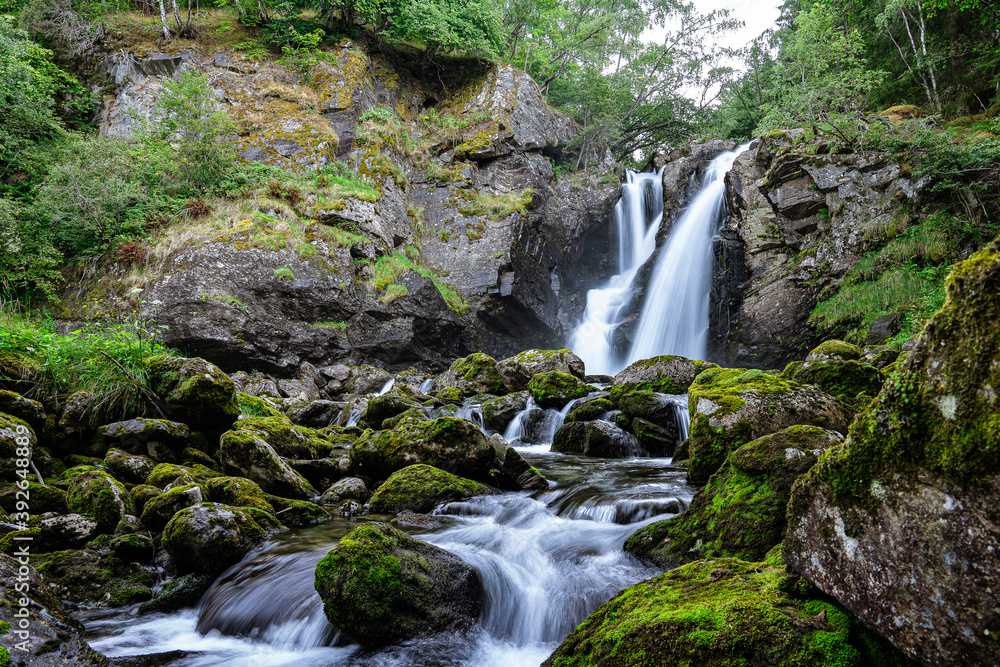Double waterfall in a forest Double waterfall in a forest