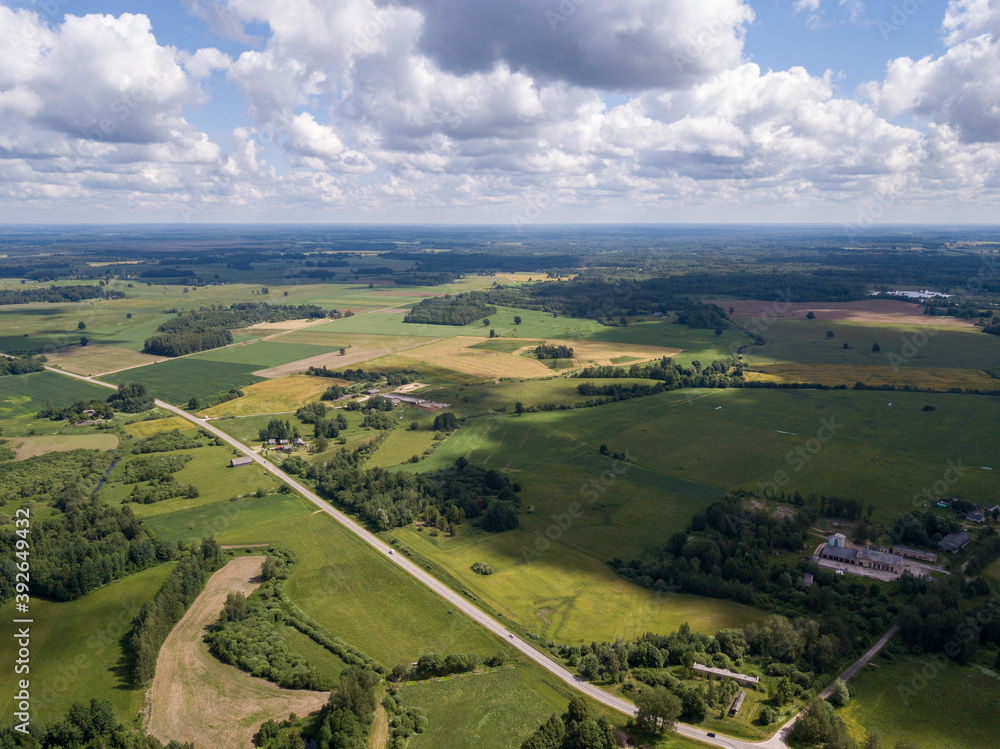countryside aerial landscape with roads and green fields in summer