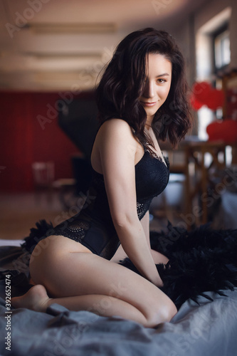 Sexy beautiful girl in black underclothes