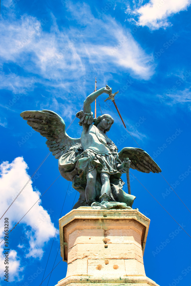 Rome, Italy - April 30, 2019 - Bronze statue of Michael the Archangel, standing on top of the Castel Sant'Angelo