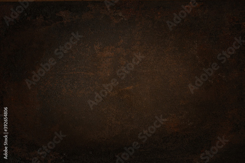 dark wall background. Empty workplace  in front of an abstract package.