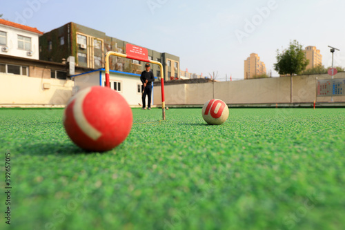 LUANNAN COUNTY, China - October 20, 2020: Chinese gateball enthusiasts are playing Chinese gateball, LUANNAN COUNTY, Hebei Province, China photo