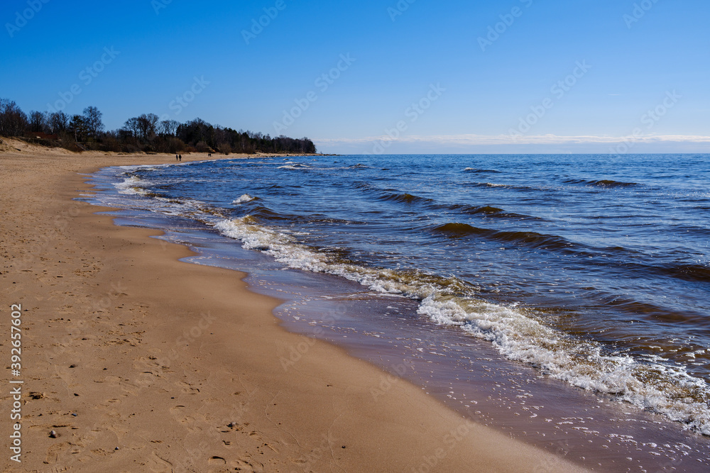 sea shore in summer beach with blue water waves and sand