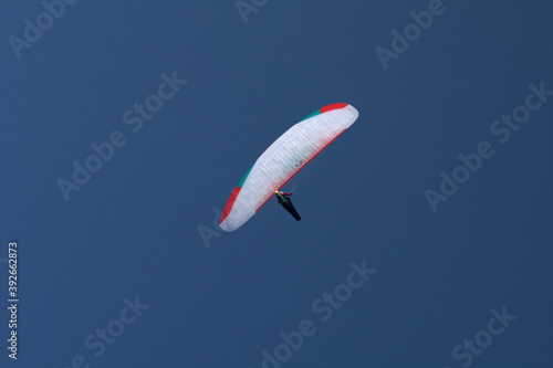 paragliding in the sky,sport, fly, paraglider, blue, air, extreme, flying, adventure,freedom, flight,