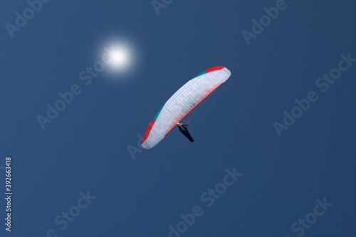 paragliding in the blue sky,sport, fly, blue, paraglider, air, extreme, adventure, paraglide, glider, flight, freedom, 