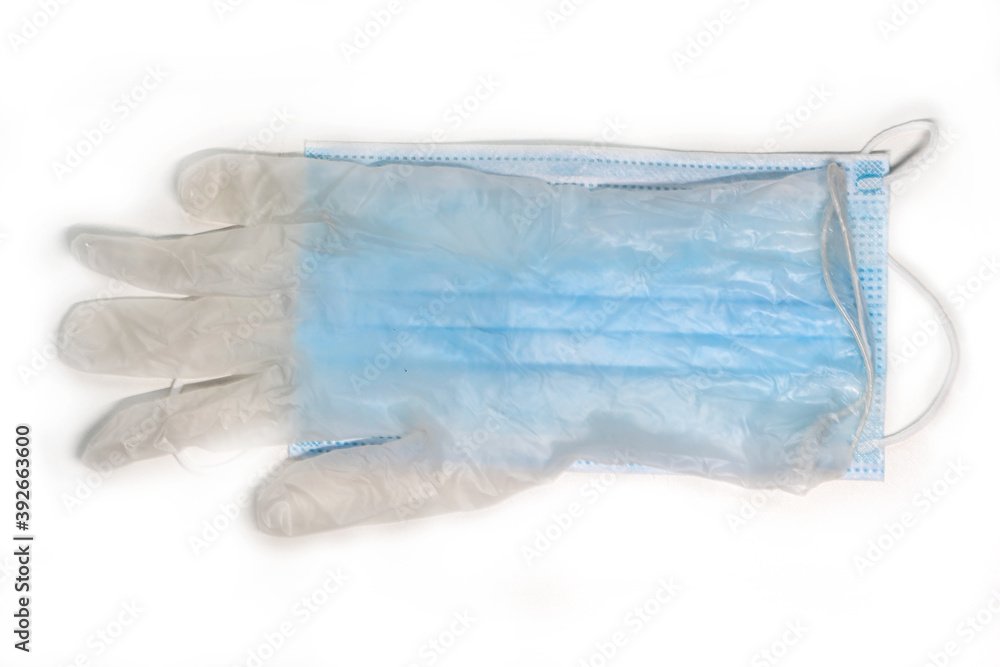 Fototapeta premium Medical dirty glove on a medical mask