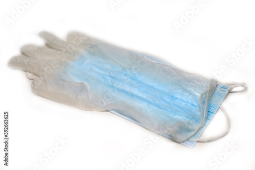 Medical dirty glove on a medical mask
