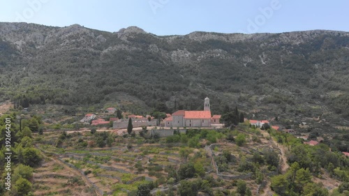 Wallpaper Mural Aerial Hyper Lapse Approaching Historic Church Building landmark in Croatia Torontodigital.ca