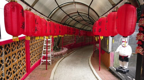 Traditional Chinese Lanterns with text in a Hong Kong street passege. photo