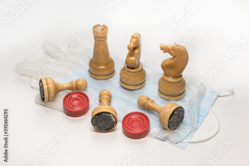 wooden chess pieces on the Medecin mask