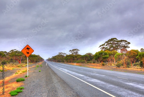Across Australian outback in the rain