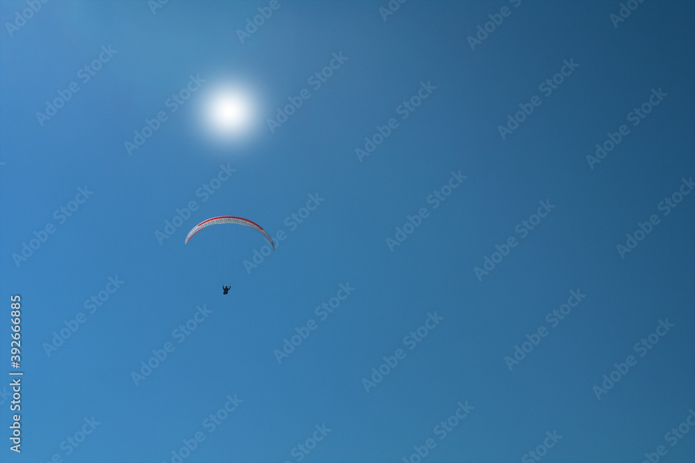 paragliding in the blue sky,flying, fly, sport, paraglider,extreme, air, gliding, freedom, adventure, glider, sun, paragliding in the blue sky,flying, fly, sport, paraglider,extreme, air, gliding, freedom, adventure, glider, sun,