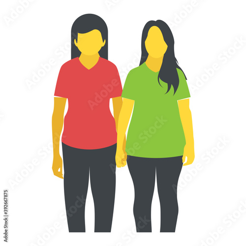 
A couple standing next to each other
