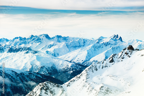 Panoramic view of snow-covered Alps mountains at sunrise. Val Thorens, 3 Valleys, France. Beautiful winter landscape © smallredgirl