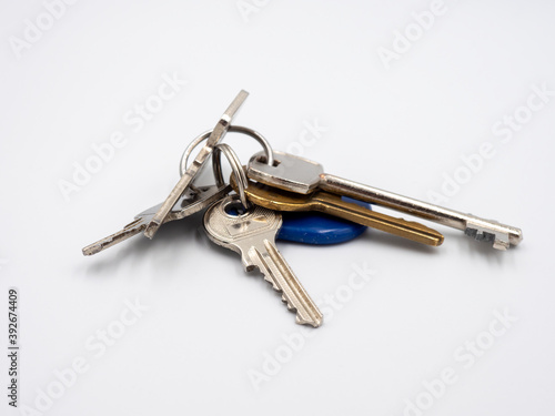 a bunch of keys on a white background © Prajzner