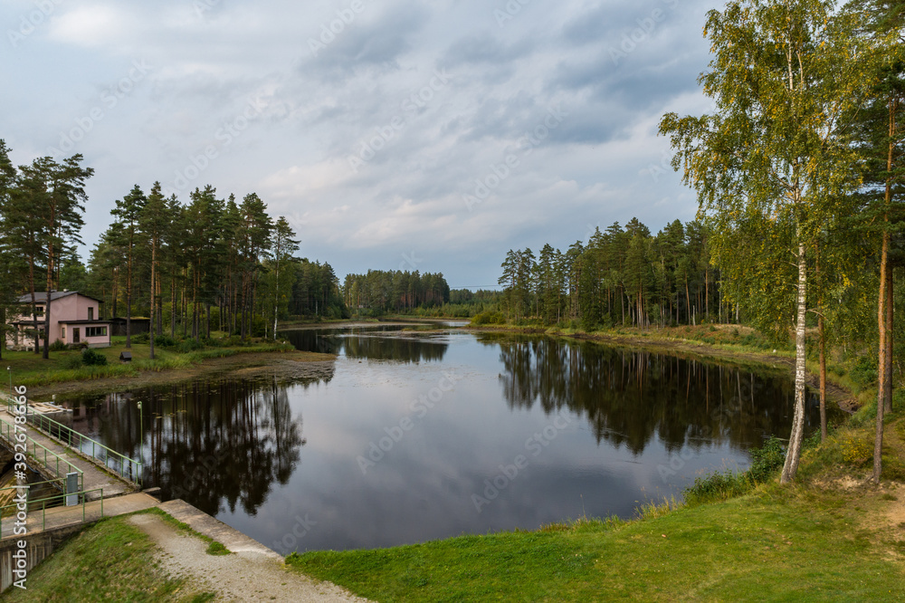 Aerial view of river among the forest. Summer nature landscape. Sunset. Aerial view of river among the forest. Summer nature landscape. Sunset.