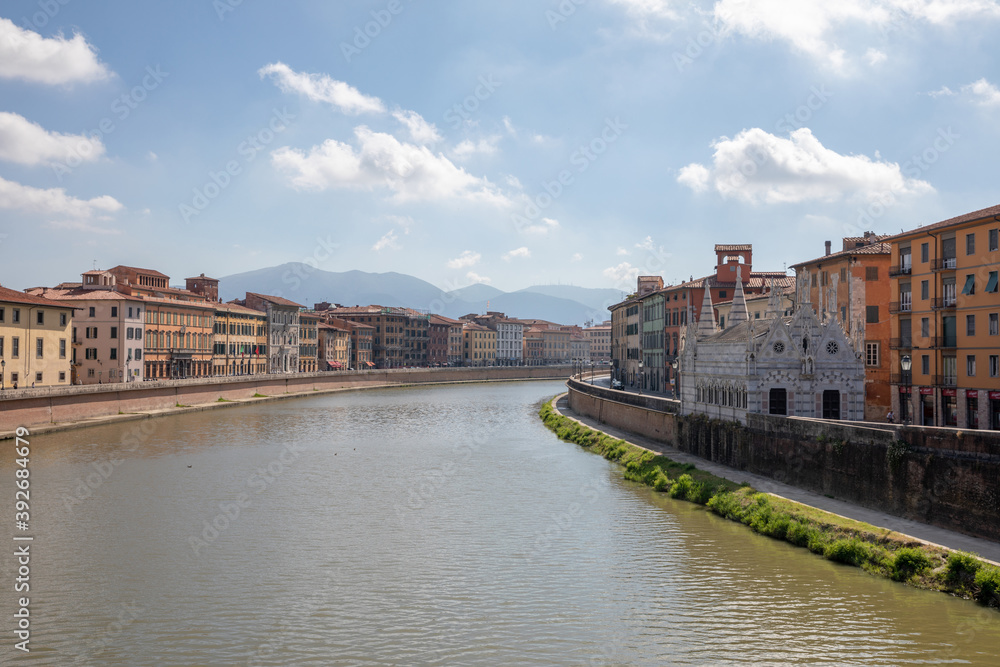 Panoramic view on historic center of Pisa city and river Arno