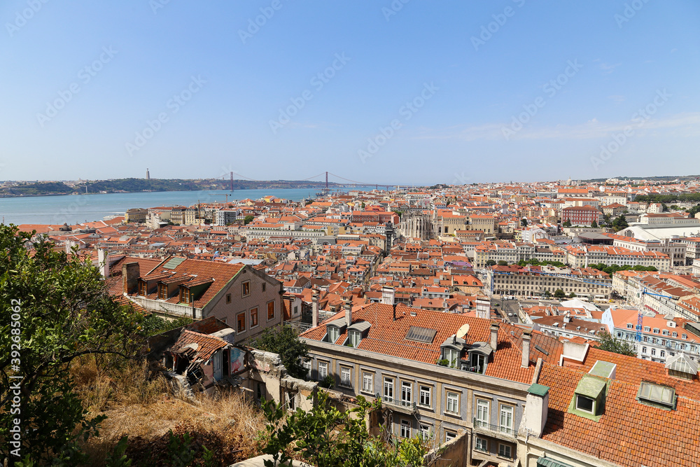 Aerial shot of the landscape of Lisbon, Portugal under a clear blue sky