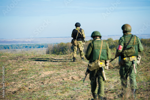 Russian special forces soldiers with weapon take part in military maneuver