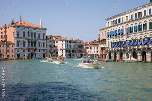Panoramic view of Grand Canal (Canal Grande) with active traffic boats © TravelFlow