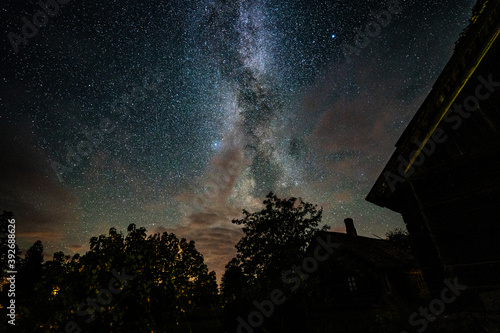 Overhead milky way with stars in clear summer night. Country side.