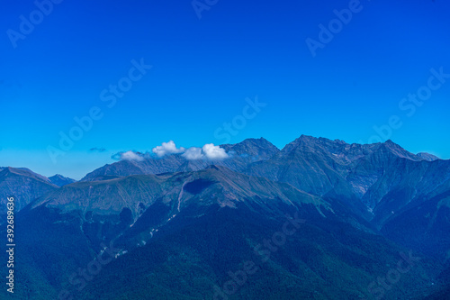 Mountain landscape in the sunlight, the tops of the mountains