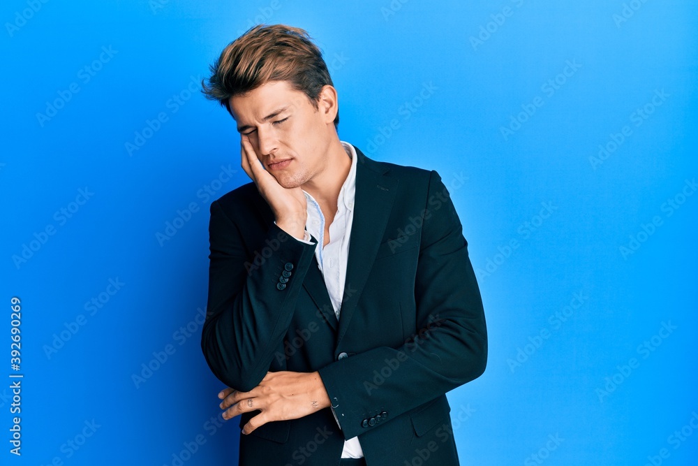 Handsome caucasian man wearing business suit and tie thinking looking tired and bored with depression problems with crossed arms. Handsome caucasian man wearing business suit and tie thinking looking tired and bored with depression problems with crossed arms.